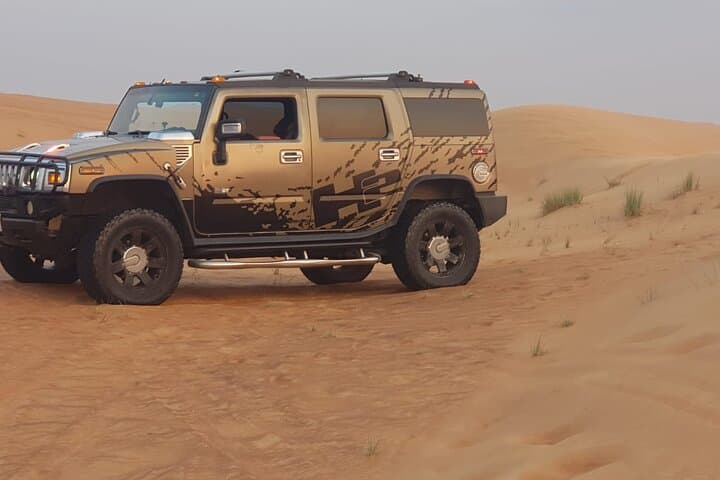 Hummer Desert Safari Tour: Dubai Dune Bashing, Camel Rides & Bedouin Camp Experience photo 1