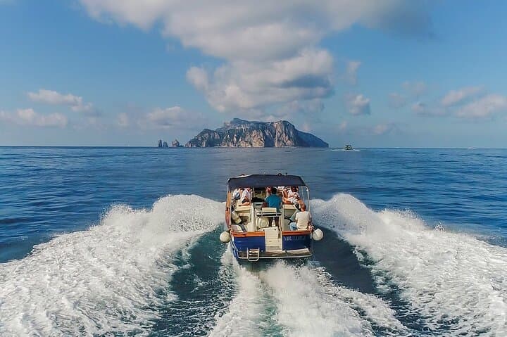 Capri Boat Tour from Positano: Blue Grotto, Snorkeling & Sunset at Li Galli photo 3