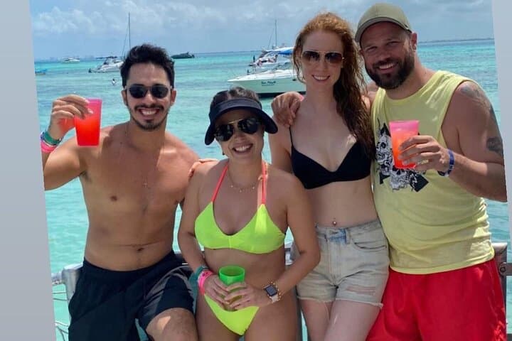 Couples Catamaran to Isla Mujeres with Open Bar & Snorkel