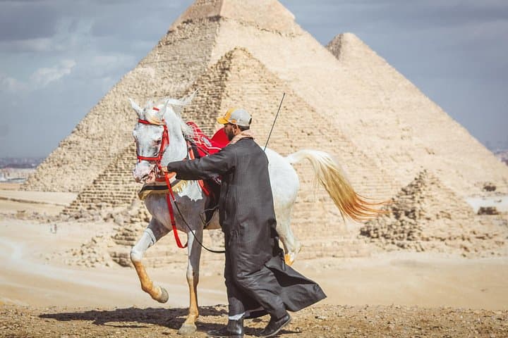 Horse and Camel Ride Around the Giza Pyramids: Sunset Photo Tour & Riding Experience photo 1