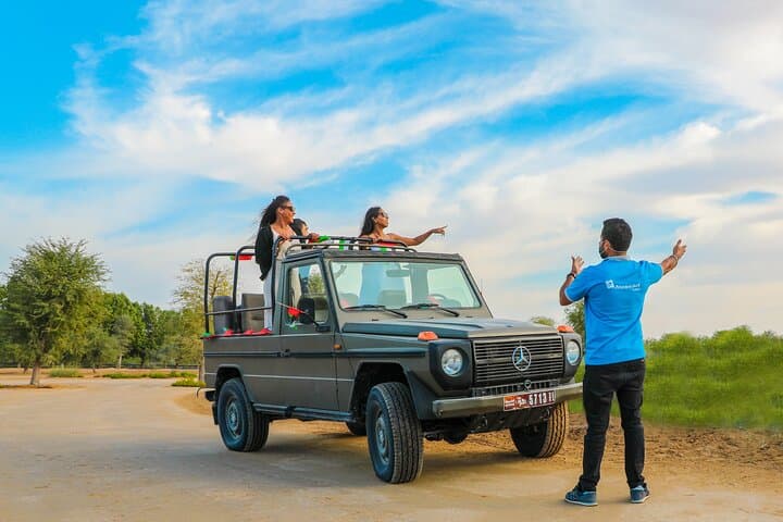 Morning Vintage G-Class Safari in Al Marmoom: Desert Ride, Bedouin Village & Camel Caravan photo 3