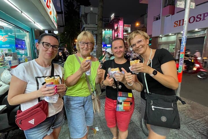 Saigon by Night: Private Motorbike Tour Through Ho Chi Minh City's Streets photo 2