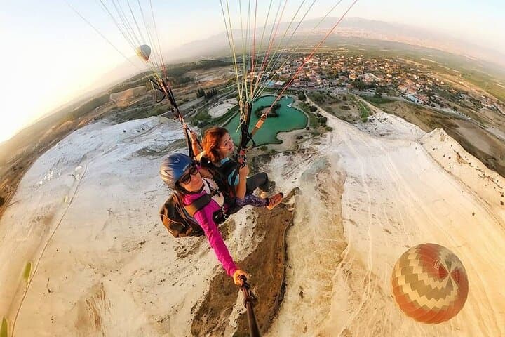 Soar Over Pamukkale: Tandem Paragliding Above the White Cliffs
