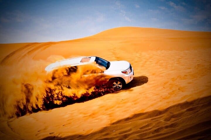 Red Dune Desert Safari Dubai: Sandboarding, Dune Bashing & Camel Ride photo 3