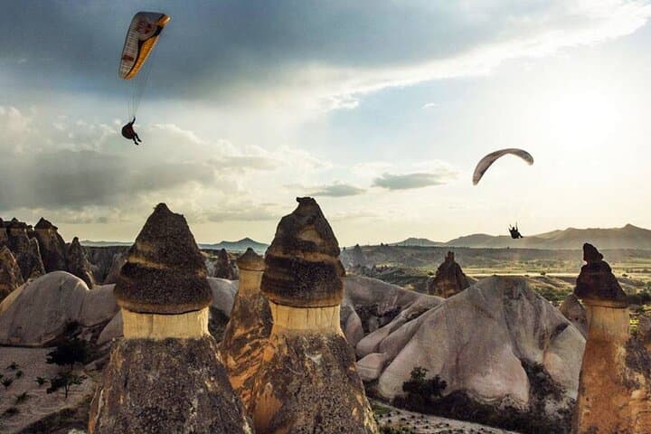 Soaring Over Cappadocia: Tandem Paragliding Above Göreme's Fairy Chimneys photo 1