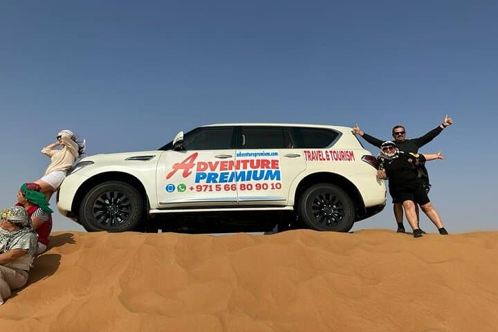 Red Dunes Rush: Lahbab Desert Safari with Quad Bikes, Sandboarding & Camels photo 6