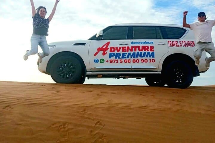 Red Dunes Rush: Lahbab Desert Safari with Quad Bikes, Sandboarding & Camels photo 4
