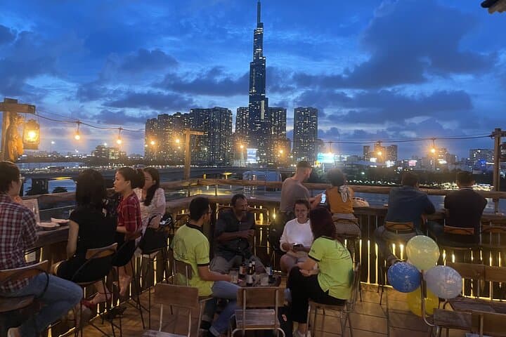 Saigon Vespa Night Food and Craft Beer Tour: Street Eats & Rooftop Pubs photo 2