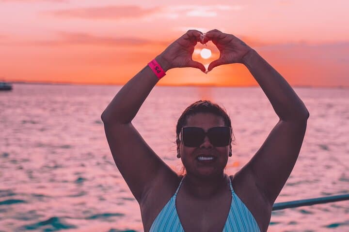 Sunset Catamaran Cruise to Isla Mujeres from Cancun: Beach Time, Town Tour & Drinks photo 5