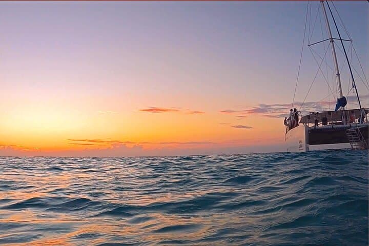 Sunset Catamaran Cruise to Isla Mujeres from Cancun: Beach Time, Town Tour & Drinks photo 6