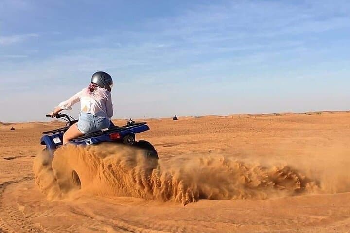 Dubai Red Dunes Quad Bike Adventure: 1-Hour ATV Ride with Pickup & Sunset Views photo 4