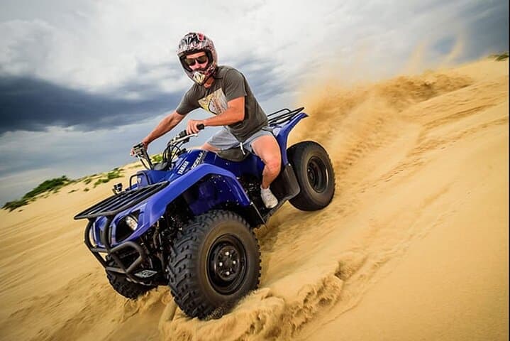 Dubai Red Dunes Quad Bike Adventure: 1-Hour ATV Ride with Pickup & Sunset Views photo 1