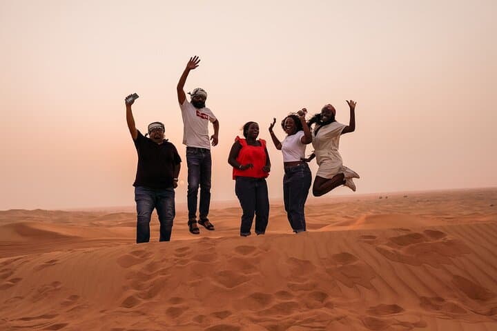 Sunrise Desert Safari in Dubai: Lahbab Dune Bashing, Sandboarding & Camel Ride photo 1