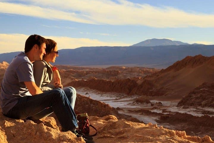 Rainbow Valley Tour in Atacama: Colored Hills, 6,000‑Year Petroglyphs & Rio Grande Market