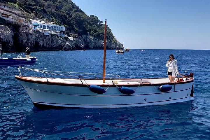 Private Full-Day Boat Tour Around the Capri Coast: Blue Grotto, Faraglioni & Snorkeling photo 3