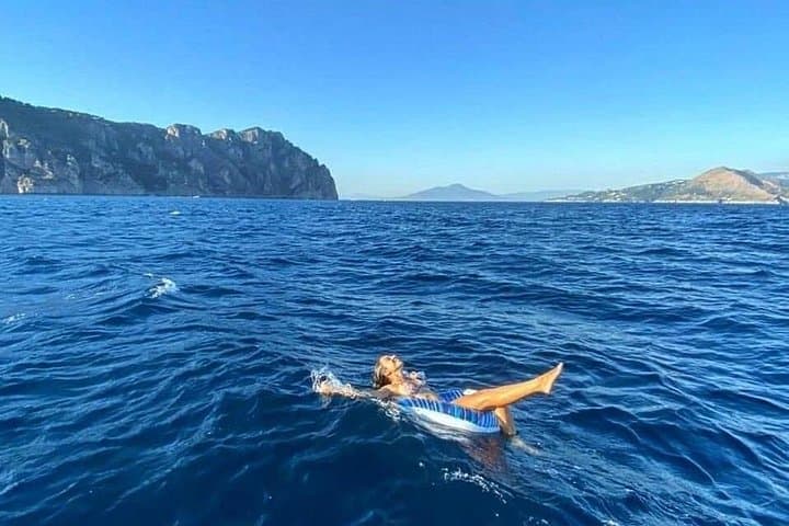 Private Full-Day Boat Tour Around the Capri Coast: Blue Grotto, Faraglioni & Snorkeling photo 4