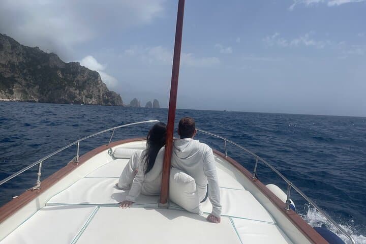Half-Day Capri Gozzo Cruise: Limoncello, Blue Grotto & Faraglioni photo 4