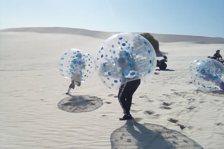 Dune Rush: Sandboarding and Bumper Ball Adventure at Atlantis Dunes