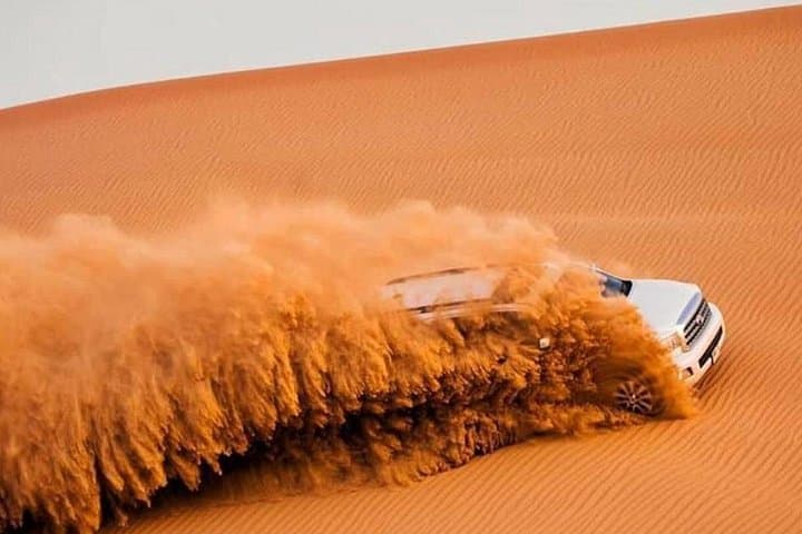 Dubai Private Morning Desert Safari at Lahbab: Camel Ride, Sandboarding & Dune Bashing photo 3