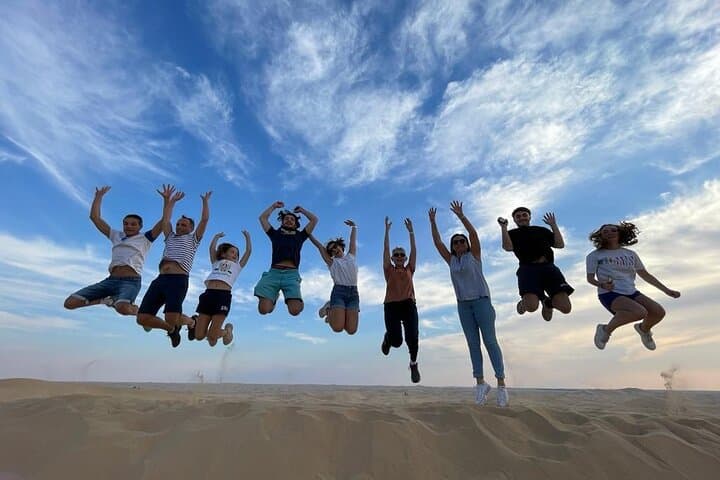Abu Dhabi Morning Safari: Dune Bashing, Camel Rides & Sandboarding