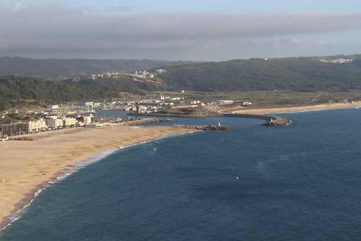 Private Lisbon-to-Porto Day Tour with Custom Stops — Nazare, Coimbra & Fatima photo 4