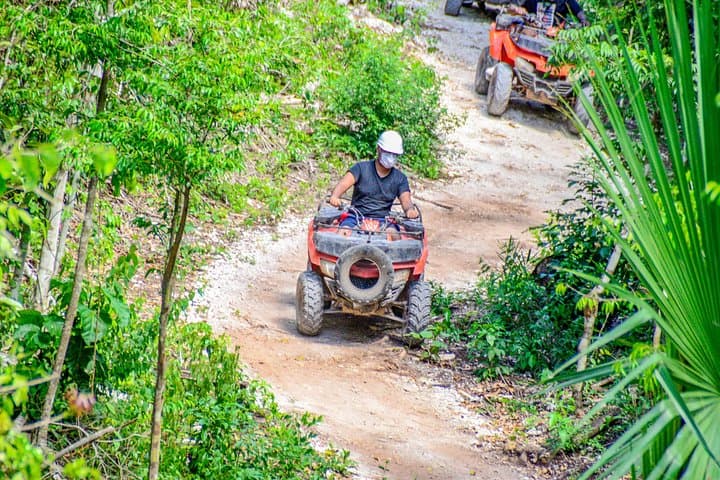 Cancun Jungle ATV, Ziplines & Cenote Tour with Lunch and Hotel Transport photo 3