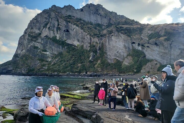 Jeju Sunrise Peak & Haenyeo Cultural Bus Tour: Seongsan, Sangumburi and Seongeup