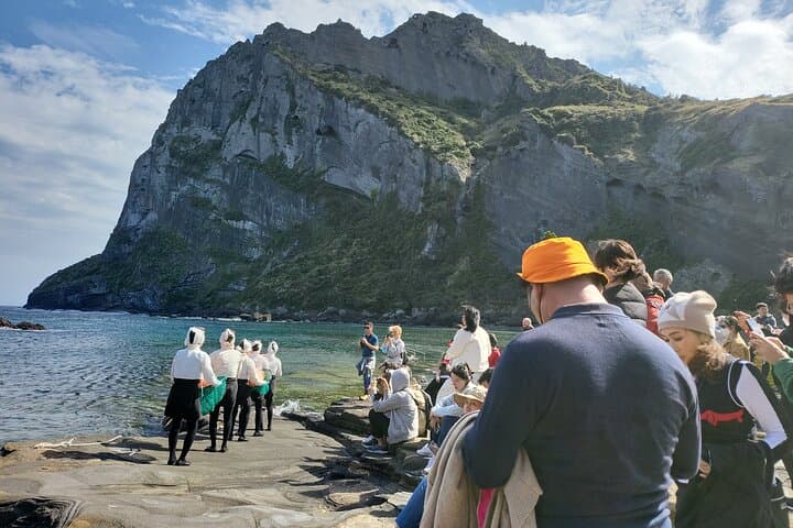 Jeju Sunrise Peak & Haenyeo Cultural Bus Tour: Seongsan, Sangumburi and Seongeup photo 3