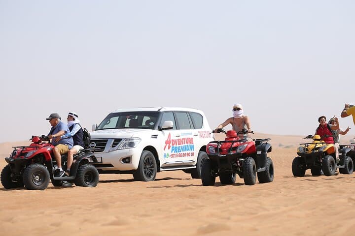 Dubai Desert Sunset Safari: 4x4 Dune Bashing, Quad Bikes, Camel Ride & BBQ