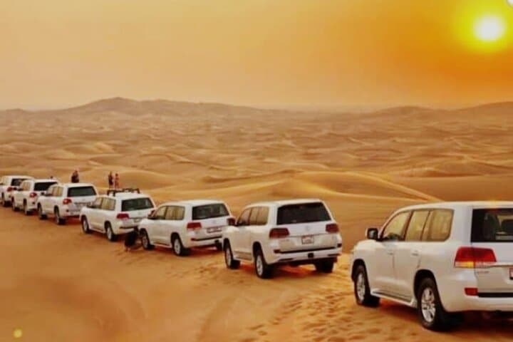 Dubai Evening Desert Safari — Dune Bashing, Camel Ride & BBQ Dinner
