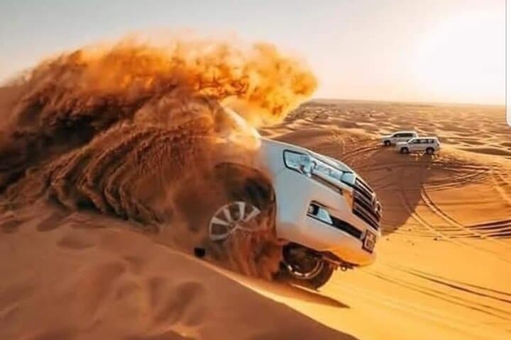 Dubai Evening Desert Safari — Dune Bashing, Camel Ride & BBQ Dinner photo 3
