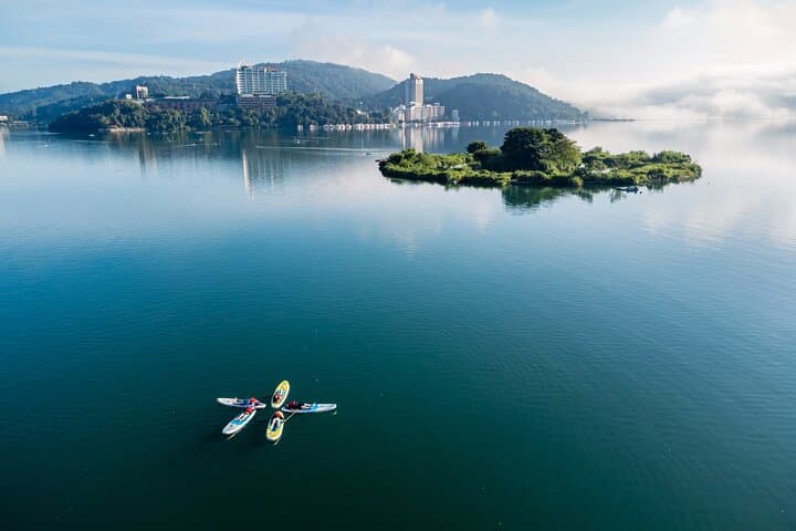 Private Stand-Up Paddleboarding on Sun Moon Lake: Glide, Learn, and Capture the View photo 4