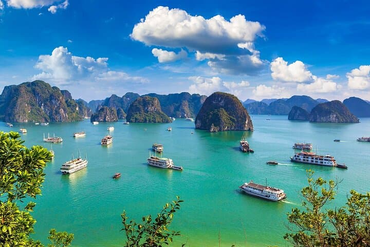 Full-Day Ha Long Bay Cruise: Kayaks, Caves & Titov Beach
