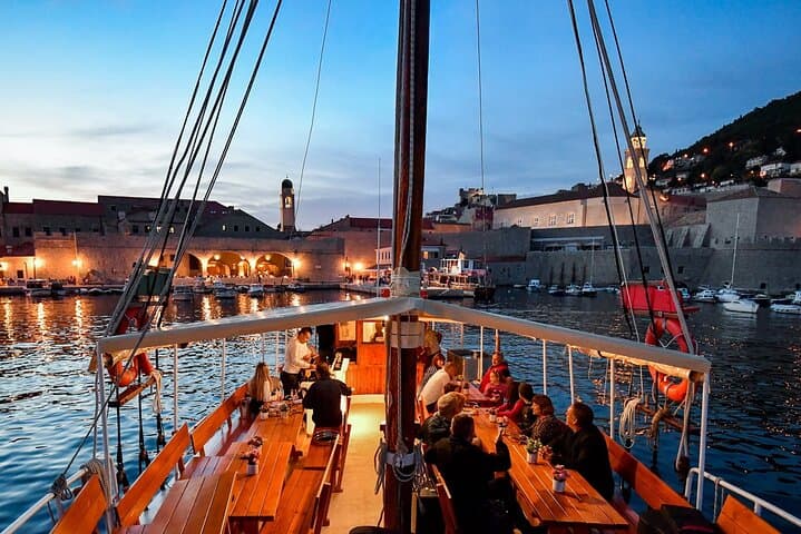 Sunset Gastro Cruise Around Dubrovnik Old Town: Dinner Aboard a Traditional Wooden Boat photo 1