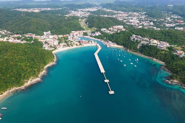 Explore Seven Bays: Full-Day Huatulco Boat Tour with Snorkeling and Seafood photo 4