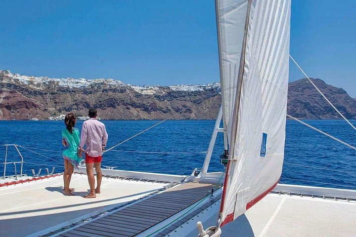 Santorini Catamaran Cruise with BBQ, Open Bar & Snorkeling photo 1