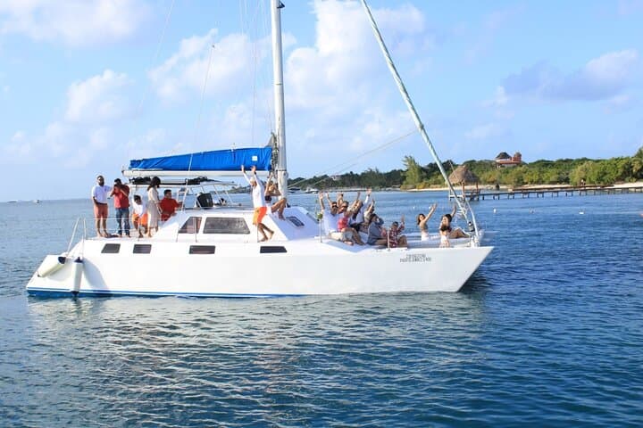 Half-Day Private Catamaran Charter from Isla Mujeres: Snorkel & Playa Norte