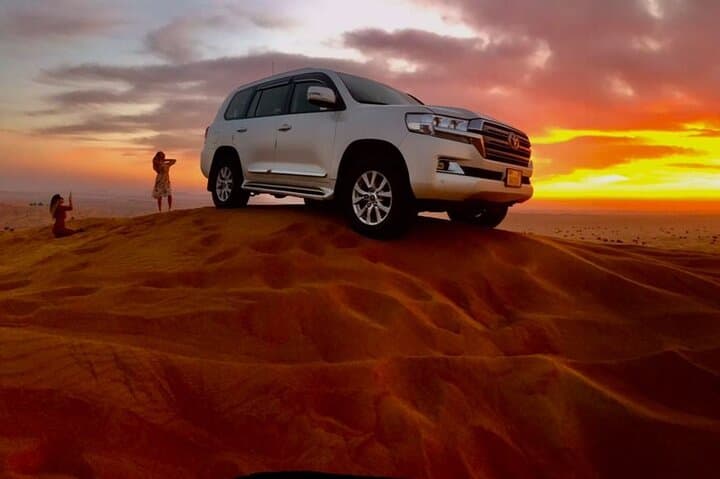 Dubai Desert Safari: Dune Bashing, Camel Ride, Sandboarding & Bedouin BBQ Experience photo 3