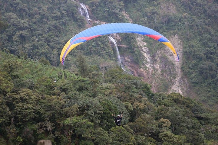 Paragliding Over Medellín Waterfalls: Tandem Flight in Antioquia Mountains