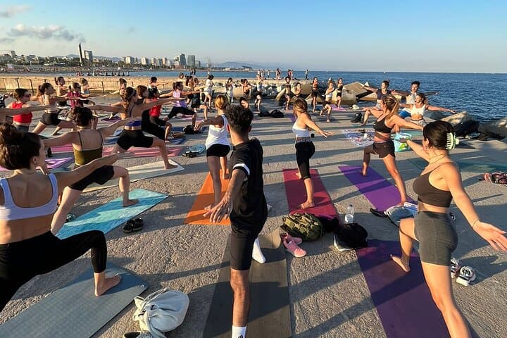Seafront Yoga in Barcelona: Hatha Vinyasa on Barceloneta Beach photo 4