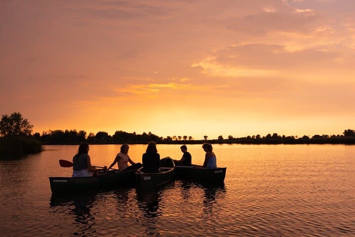 Sunset Canoe Tour in Waterland: Polders, Windmills & Lakeside Dinner