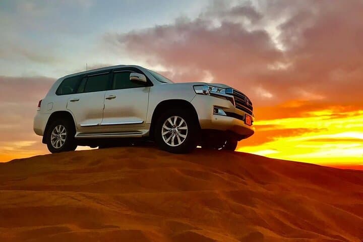 Dubai VIP Red Dunes Desert Safari: Dune Bashing, Camel Ride & VIP Dinner