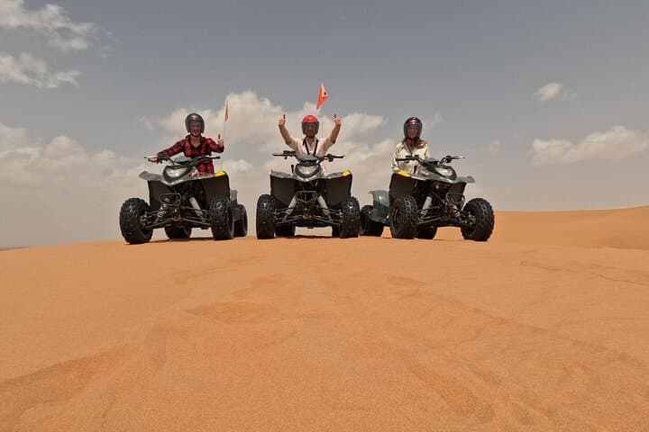 Muscat Desert Adventure: Full-Day Private Quad Biking, Camel Ride & Sandboarding