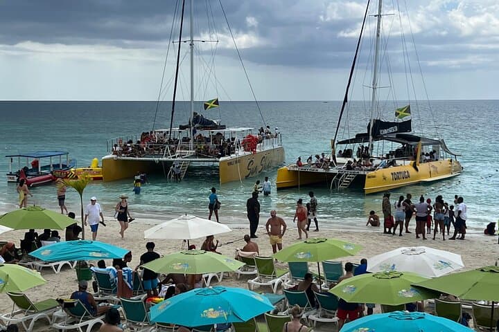 Experience Negril: Catamaran Cruise and Sunset at Ricks Cafe