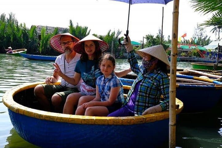 Hoi An Riverboat & Basket Boat Experience: Fishing, Lantern Making and Ancient Town Walk photo 2