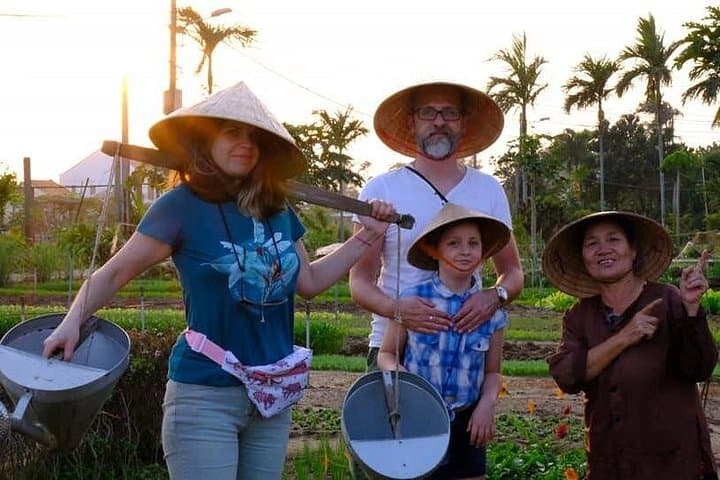 Hoi An Countryside Life Tour: Tra Que Farming, Basket Boat & Pottery photo 1