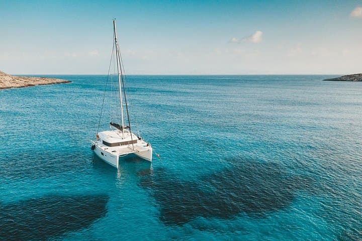 Santorini Semi-Private Catamaran Cruise with BBQ and Volcano Hot Springs photo 1