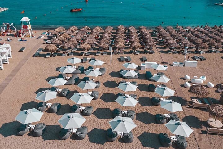 First-Row Sunbeds at Super Paradise Beach Mykonos — Reserve a Prime Spot photo 5