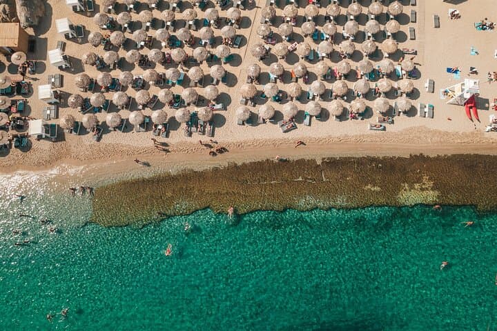 First-Row Sunbeds at Super Paradise Beach Mykonos — Reserve a Prime Spot