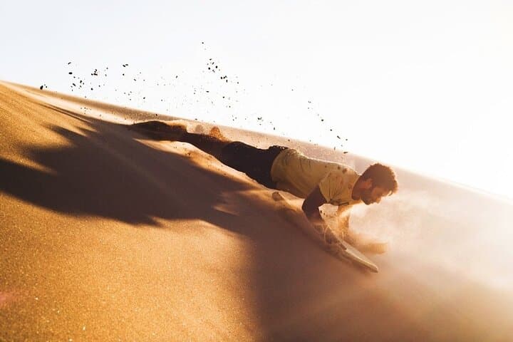 Red Dune Desert Safari Dubai: Sandboarding, Dune Bashing & Camel Ride